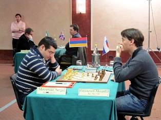 Movsesyan half point back off lead