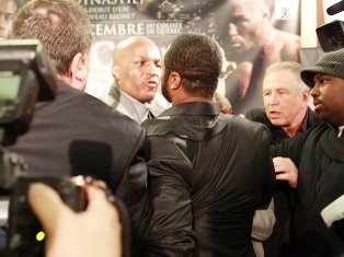 Boxers come to blows at news conference (video)