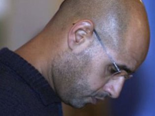 Сыну Каддафи и его сторонникам предъявлено обвинение в суде