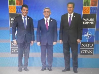 Rasmussen and Cameron greet Armenia president