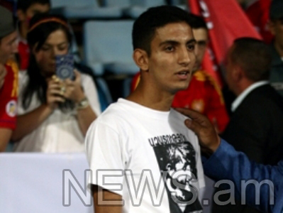 Son of Armenian political prisoner removed from field during Armenia v. Denmark match
