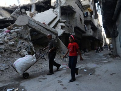После атак в Париже 22 штата США отказались принять беженцев из Сирии