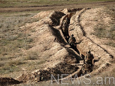 Armenia MOD trying to identify dead body, with Azerbaijan military uniform, near outpost