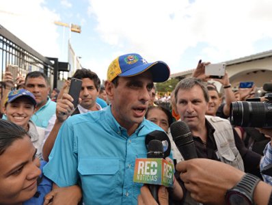 Venezuelan opposition leader tear-gassed during protest