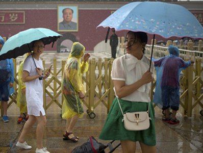Floods and heavy rains kill 26 in South China