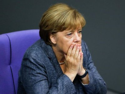 Merkel cautions over compensation to European firms working with Iran