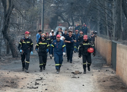 Wildfires kill at least 74 near Athens