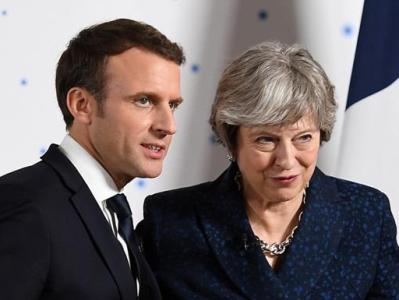 Theresa May cuts short holiday for Brexit talks with Macron
