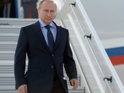 Putin arrives in China
