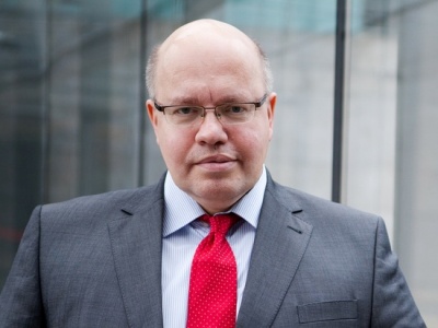 German Economy Minister hospitalized after falling off stage