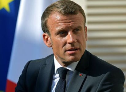 Macron agrees to postpone digital tax collection until end of year