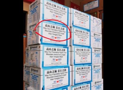 What is written on the boxes of assistance sent from China to Armenia?