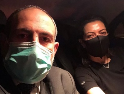 Armenia PM posts photo of him and wife wearing face masks in car