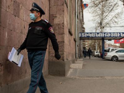 AP: Armenian TV stations see politics in police checking masks