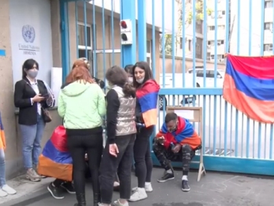 Group of citizens protesting outside UN office in Armenia