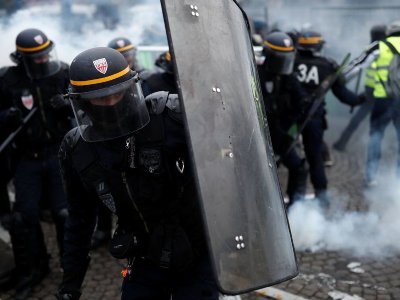 Parisian police use tear gas on protesters against police violence
