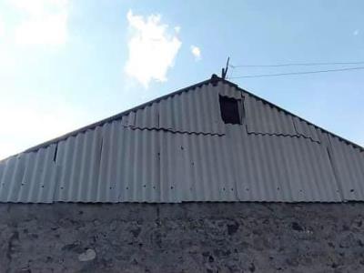 Shelling from Azerbaijan damaged wall of one of residential buildings in Kut village
