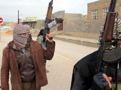 IS fighters attack army barracks in mountainous area north of Baghdad, killing 11 soldiers