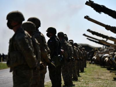 NATO officials drop claim of 300,000 troops
