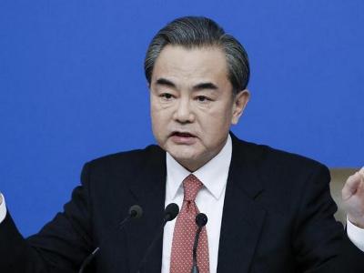 Chinese FM urges US to stop slandering China's political system