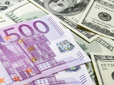 Euro reaches parity with dollar for the first time in 20 years
