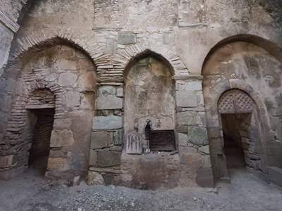 Cross-stone and tombstone found during cleaning of monastic complex in Artsakh