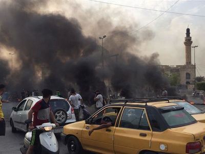 At least 20 killed in armed clashes in downtown Baghdad