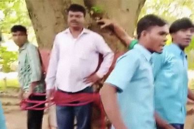 Indian teens tie their math teacher to a tree and beat him up for bad grades