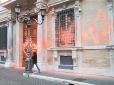 Eco-activists in Rome throw orange paint on Senate building of Italian Parliament