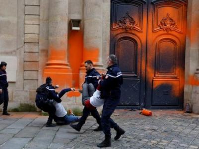 Climate activists spray-painted front gate of French prime minister's office