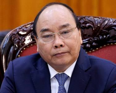 CNA: Vietnam's president resigned over corruption scandal involving his wife