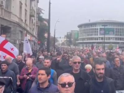 EU flag is burned during demonstration outside Georgia parliament