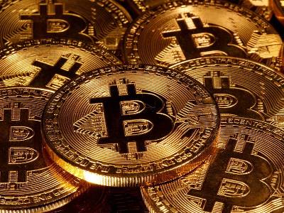 Bitcoin rises nearly 7% to $30,200