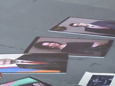 Aliyev, Pashinyan and his wife’s photos on the ground, painted in red, outside Armenia government building