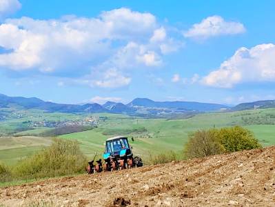 Azerbaijan shoots at combine harvester doing agricultural work in Karabakh village field