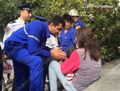 В Ереване женщина с ребенком на руках грозится бросится с моста