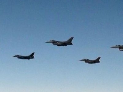 Japan fighter jets fire flares at Russia military plane for first time