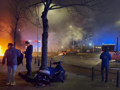Mass riots – involving over 100 people – break out in The Hague 