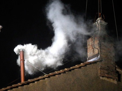 White smoke rises from Sistine Chapel chimney in Vatican: new pope elected