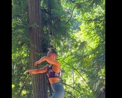 Woman sets world record by hanging by her hair for more than 25 minutes