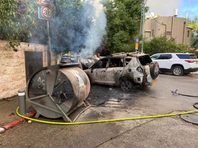 Protesters against military operations in Gaza set fires in Jerusalem