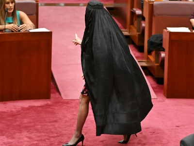 Australia senator suspended from parliament for wearing burqa in protest