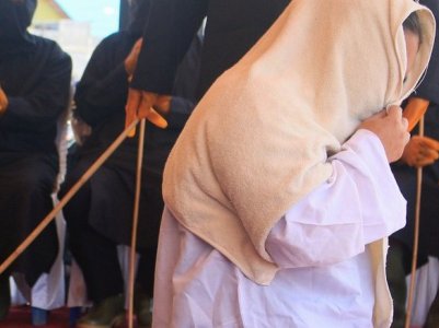 Woman in Indonesia publicly caned 140 times for having sex outside marriage, drinking alcohol