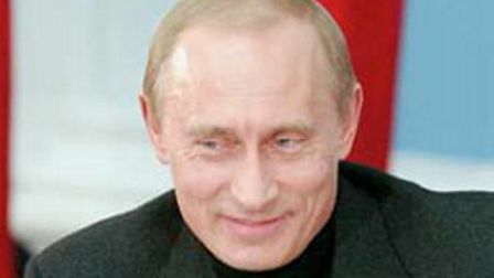 Владимир Путин сдержанно отреагировал на эротический календарь