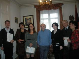 Charles Aznavour awards certificates to several Swiss Armenians