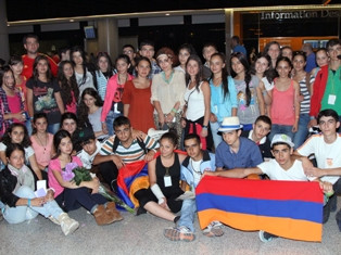 Yerevan schoolchildren return from summer camp in Romania