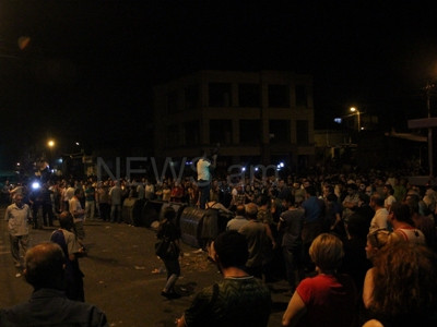 Yerevan protesters build barricades using trash cans
