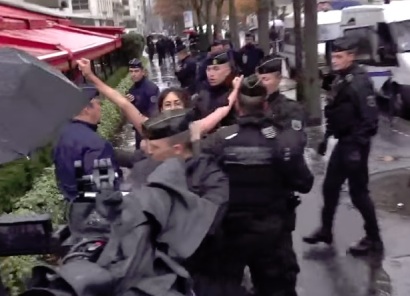 Femen Activist tries to break through Trump's motorcade in Paris