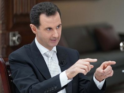 Благодарные за освобождение от ИГ сирийцы посадили Асада себе на плечи