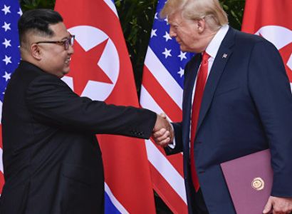 Donald Trump exchanges symbolic handshake with Kim Jong-un in demilitarized zone